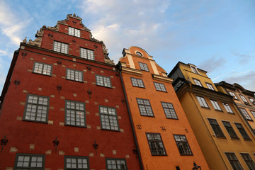 Fototapeta na wymiar Famous Swedish red and yellow houses on Stortorget in old town of Stockholm, Sweden