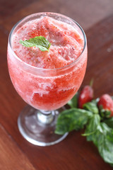 strawberry juice with mint leave on topping