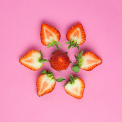 Strawberries isolated on pink background. Fresh berry flat lay. Creative food concept. Copy space,...