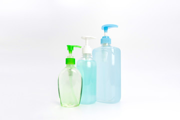 coronavirus (COVID-19) protection blue and green gel sanitizer set, isolated on white background in studio light.