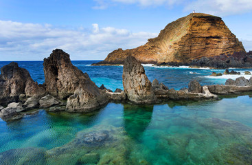 Fototapeta na wymiar Swimming natural pools of volcanic lava in Porto Moniz, Madeira island, Portugal, Europe