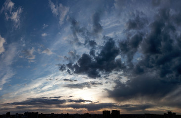 time lapse clouds over city