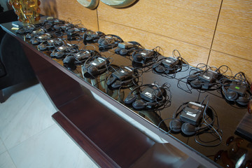 A set of headphones for simultaneous translation during negotiations in foreign languages....