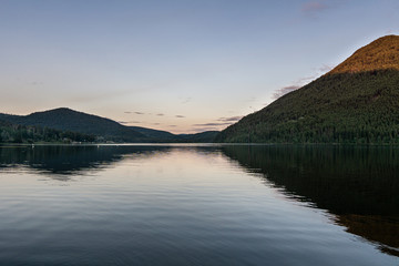 calm paul lake during a summer evening british columbia canada.
