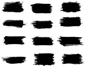 set black strokes of paint isolated on a white background.