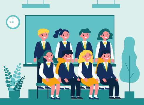 Happy students posing for photo in classroom. Cheerful teen girls and guys in school uniforms sitting and standing at blackboard. Vector illustration for photography, classmates, education concept