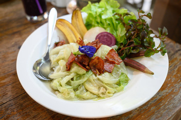 Stir-Fried Cabbage with Fish Sauce with crispy bacon. thai food