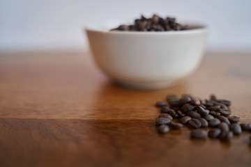 Detail coffee beans on wood table