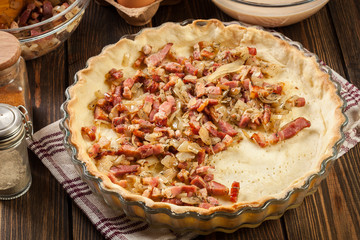 Making stuffing while preparing a traditional quiche