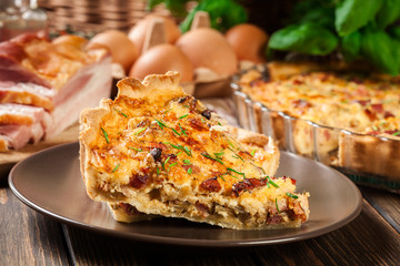 Pieces of quiche lorraine with bacon and cheese