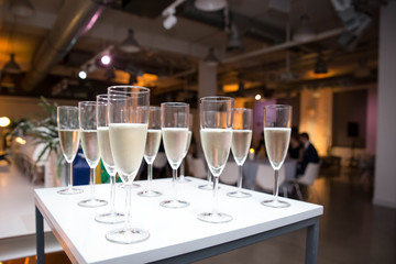 Glasses with champagne, wine at the event, party