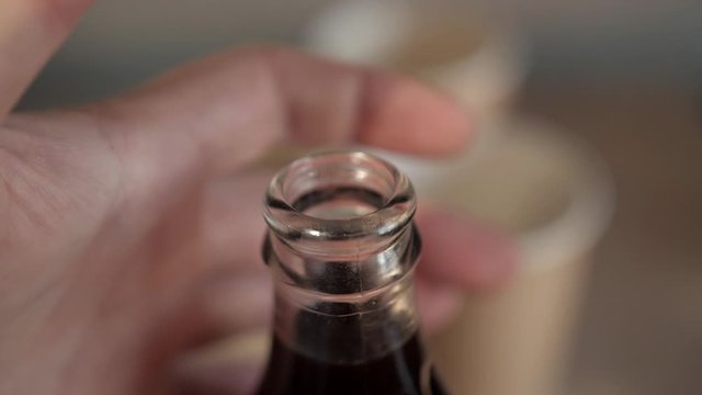  hand opening bottle by flicking thumb 