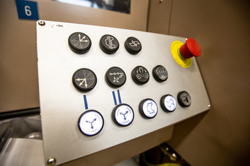 Machine in a factory with buttons