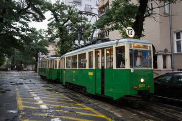 Fototapeta na wymiar Old tram in Poznan. it's raining