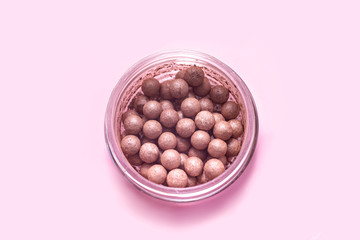 Obraz na płótnie Canvas Close up of face powder pearls in an open powder box.
