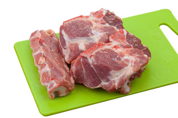 raw red pig meat on  white background