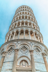 Straight leaning Tower of Pisa on a cloudy day