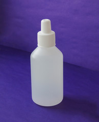 antiseptic for hands on a blue background