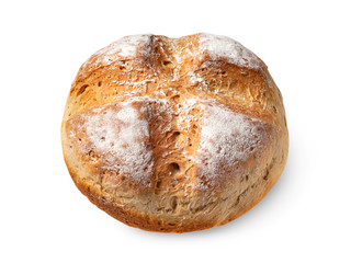 Homebaked bread. Round peasant bread isolated on a white background.