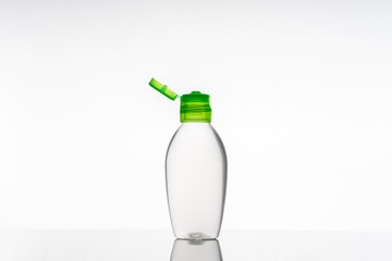 One small bottle of antiseptic liquid sanitizer disinfectant gel for hands on white background with space for copy