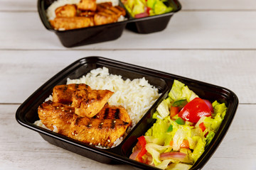 Healthy food delivery or take away lunch in container.