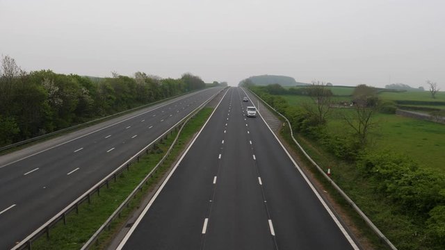 4K: Empty Deserted UK motorway with virtually no traffic during Lockdown for COVID-19 Coronavirus. Stock Video Clip Footage