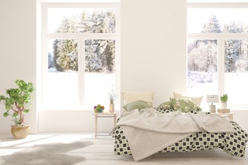 Stylish bedroom in white color with winter landscape in window. Scandinavian interior design. 3D illustration