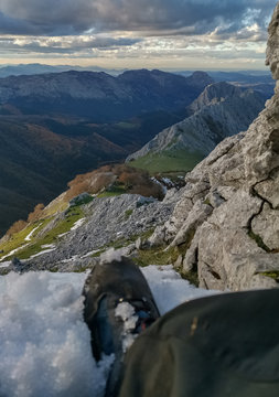 Mountaineer resting on the top of the mountain