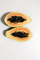 Healthy fruit papaya on white table
