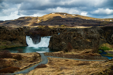 Hj&aacute;lparfoss double waterfall in Iceland
