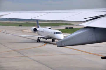 Fototapeta na wymiar Airplane on the ground, Texas, Houston Airport