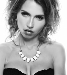 Beautiful alluring young woman in sexy lingerie isolated on whit
