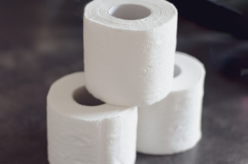 Close-up of the last pieces of   toilet paper rolls products for sale     on the  store shelf .