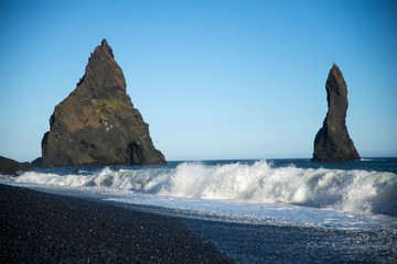 waves crashing on rocks