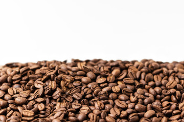 medium roast coffee beans on white