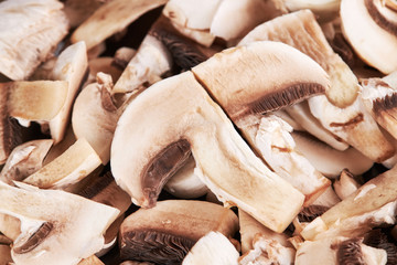 raw champignon slices  background backdrop. above view.