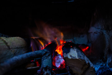 Fototapeta premium Fuego y leña