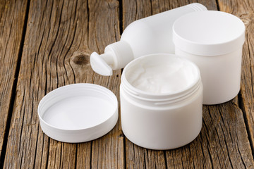 Natural hand cream on wooden table