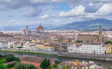 Aerial view of the city of Florence, Italy, with the Cathedral of Santa Maria di Fiori and the Basilica of Santa Croce in the background