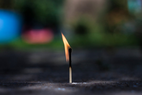 Close-up Of Burning Matchstick