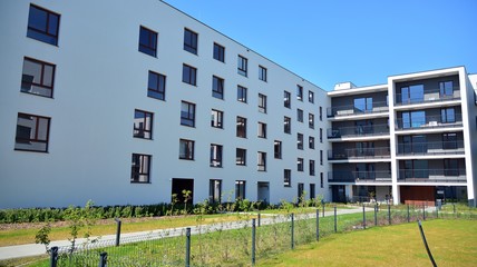 Modern apartment building  on a sunny day with a blue sky. Facade of a modern apartment.