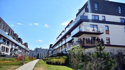 Modern apartment building  on a sunny day with a blue sky. Facade of a modern apartment.