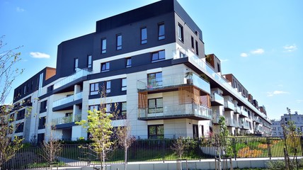 Modern apartment building  on a sunny day with a blue sky. Facade of a modern apartment.