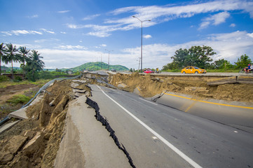 Fototapeta na wymiar Portoviejo, Ecuador - April, 18, 2016: Cracked road after 7.8 earthquake