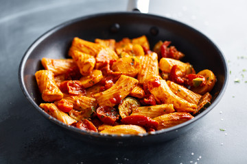Pasta with tomato sauce with vegetables