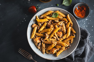 Pasta penne with mushrooms and sauce