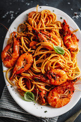 Pasta spaghetti with tomato sauce and shrimps
