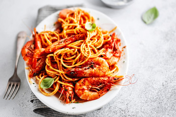 Pasta spaghetti with tomato sauce and shrimps