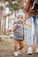 Mom and son walking in a park