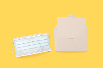 Blank white card with medical mask mock up